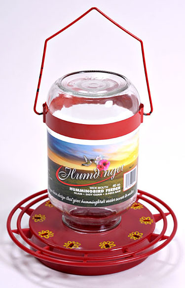 Item # - 40oz Easy fill glass container Guaranteed not to drip. Designed to feed ONLY hummingbirds. Red ABS Plastic base (non-metallic) Full ring perch with 10 feeding stations with metal hanger. Case Qty:6